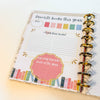 Planner with a page titled 'Favorite books this year' on a light background