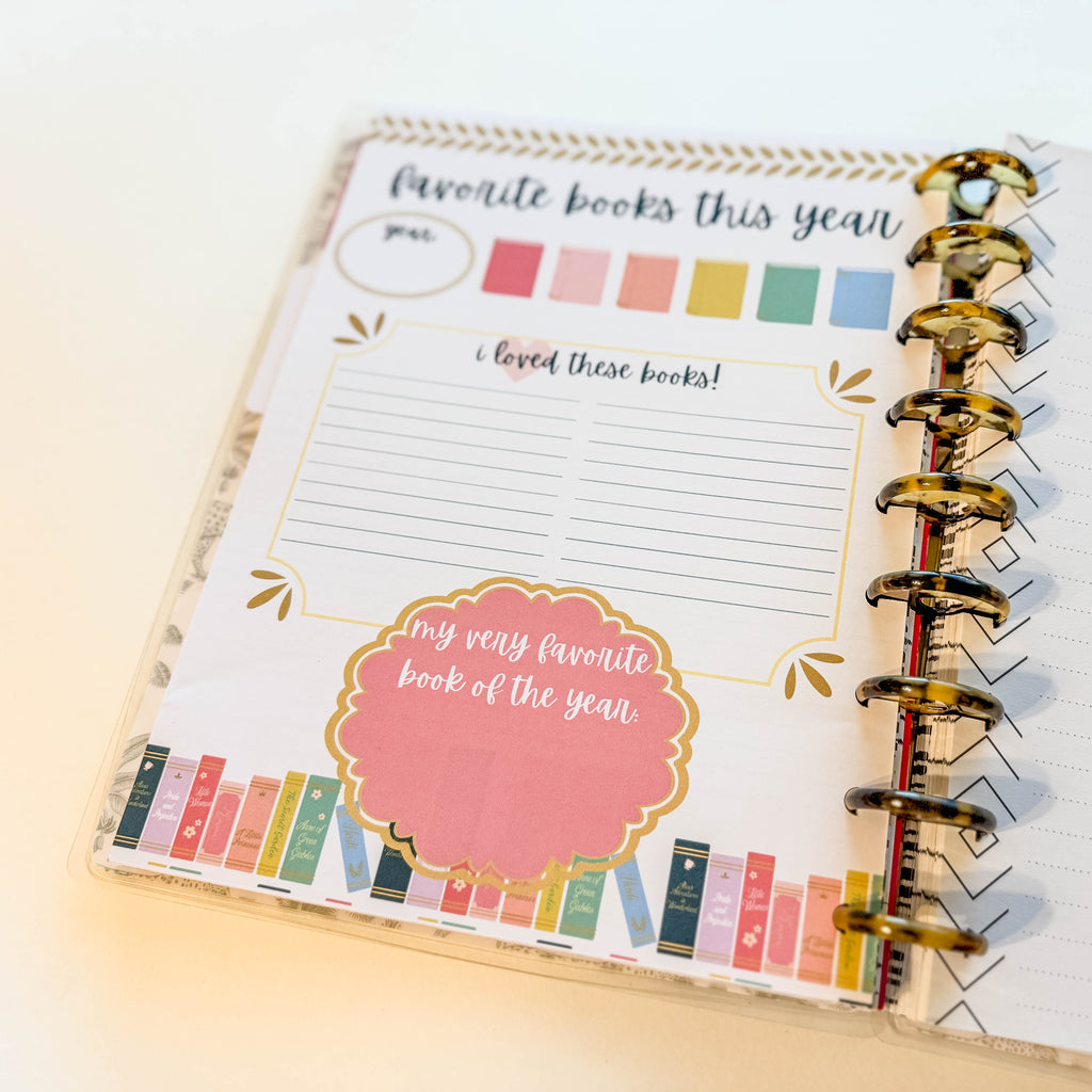Planner with a page titled 'Favorite books this year' on a light background