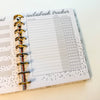 Audiobook tracker page in a planner with star ratings.