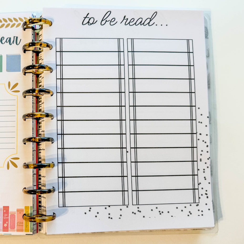 Planner with sections for 'favorite books this year' and 'to be read'.