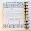 Planner page titled 'Favorite books this year' with a spiral binding on a light background