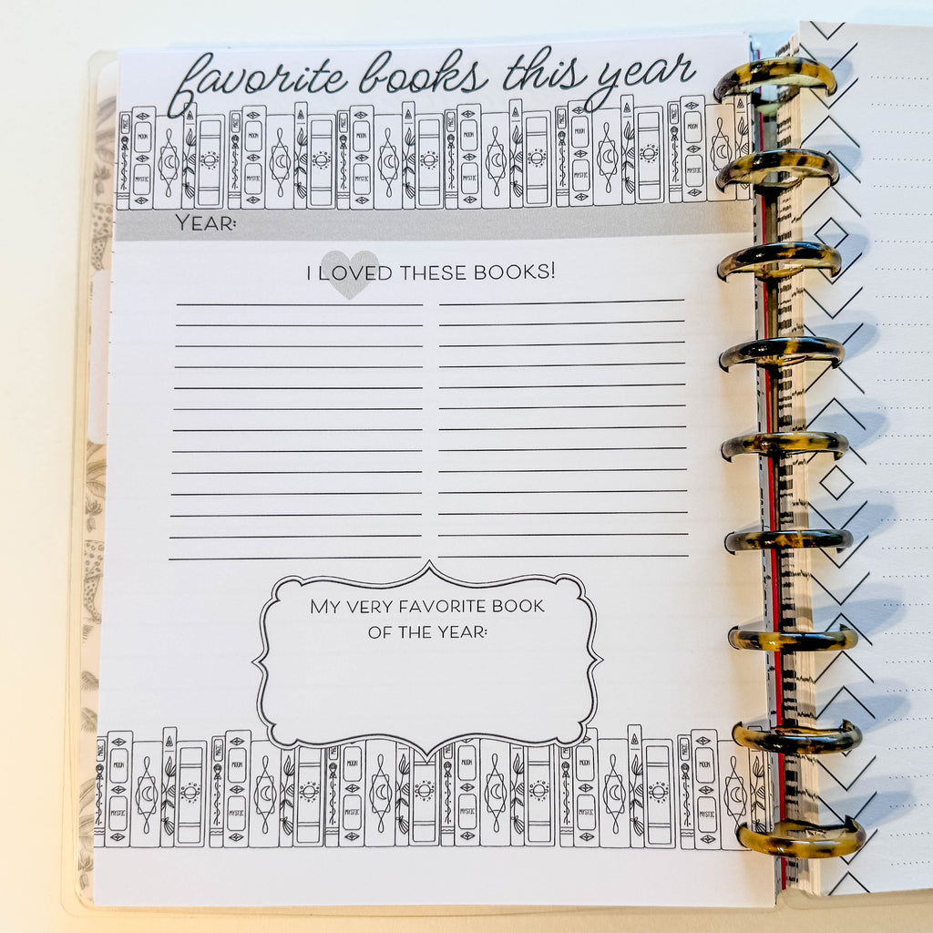 Planner page titled 'Favorite books this year' with a spiral binding on a light background